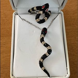 Sterling silver snake black gold and red stones ring and necklace